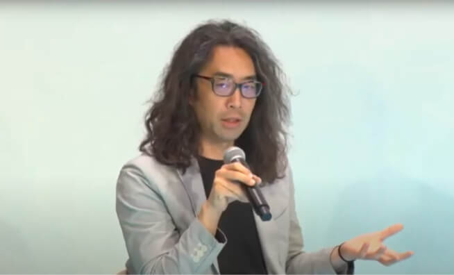 写真:パネルディスカッションで話している平山雄太 氏