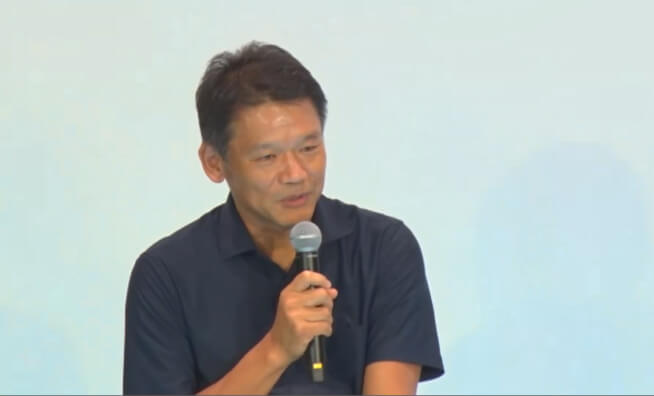 写真:パネルディスカッションで話している宮坂学 氏